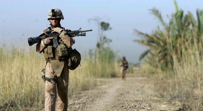 Marines on patrol in Fallujah. Marines on patrol in Fallujah.
