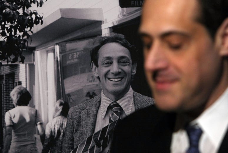 Stuart Milk, the nephew of the late gay activist Harvey Milk, sits next to a photograph of his uncle after a press conference announcing legislation to create a Harvey Milk Day in California March 3, 2009 in San Francisco. ( Justin Sullivan/Getty)