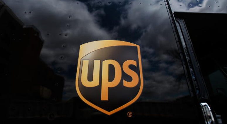 The United Parcel Service logo is emblazoned on the side of a delivery truck The United Parcel Service logo is emblazoned on the side of a delivery truck