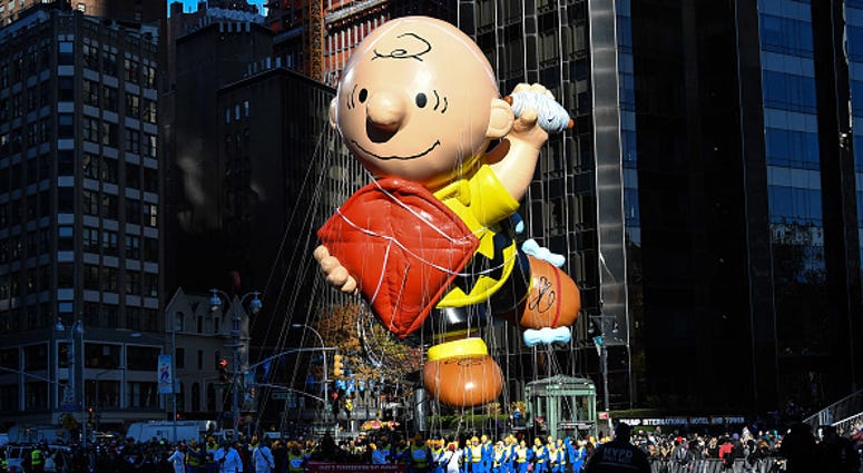The Charlie Brown balloon floats in Columbus Circle during the 91st Annual Macy's Thanksgiving Day Parade on November 23, 2017 in New York City. The Charlie Brown balloon floats in Columbus Circle during the 91st Annual Macy's Thanksgiving Day Parade on November 23, 2017 in New York City.