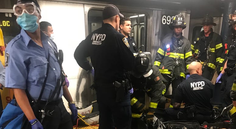 First responders at the scene. Man killed by subway train Harlem