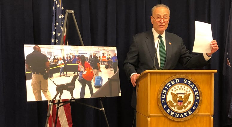 Sen. Schumer slams Trump budget cuts at his office in midtown. Schumer VIPR dog teams