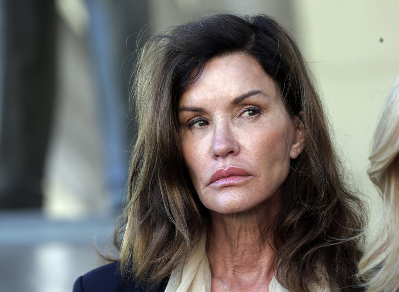 FILE - In a Tuesday, March 29, 2016 file photo, model Janice Dickinson appears outside Los Angeles Superior Court after a judge ruled her defamation lawsuit against Bill Cosby will move forward. Dickinson, a model and reality TV star, says Cosby knocked h FILE - In a Tuesday, March 29, 2016 file photo, model Janice Dickinson appears outside Los Angeles Superior Court after a judge ruled her defamation lawsuit against Bill Cosby will move forward. Dickinson, a model and reality TV star, says Cosby knocked h