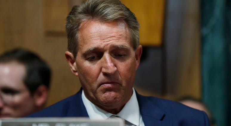 Sen. Jeff Flake, R-Ariz., listens during a meeting of the Senate Judiciary Committee, Friday, Aug. 28, 2018 on Capitol Hill in Washington. Sen. Jeff Flake, R-Ariz., listens during a meeting of the Senate Judiciary Committee, Friday, Aug. 28, 2018 on Capitol Hill in Washington.