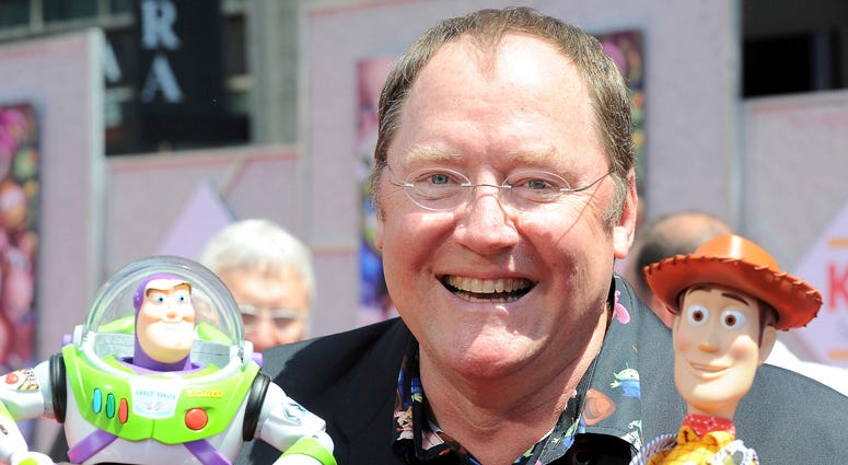 FILE - In this June 13, 2010 file photo, John Lasseter arrives at the world premiere of "Toy Story 3," at The El Capitan Theater in Los Angeles. FILE - In this June 13, 2010 file photo, John Lasseter arrives at the world premiere of "Toy Story 3," at The El Capitan Theater in Los Angeles.
