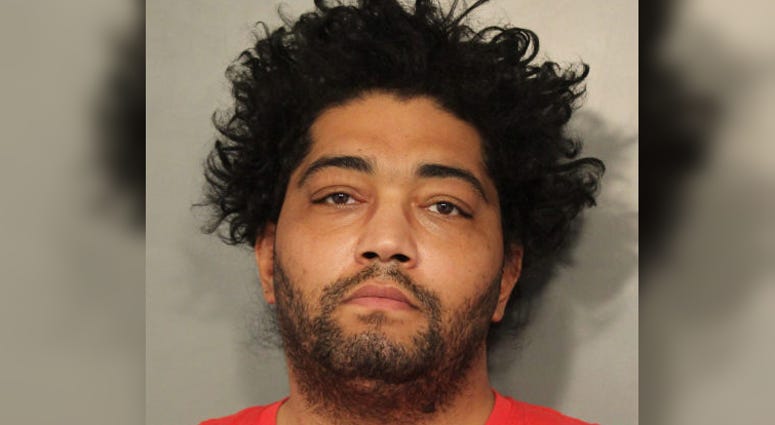 John Harvey, 38, is accused of pulling a knife during a parking dispute. John Harvey, 38, is accused of pulling a knife during a parking dispute.