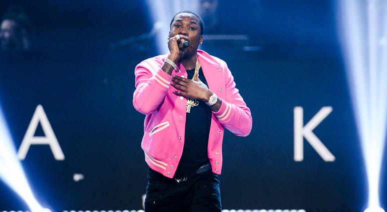 NEW YORK CITY - NOVEMBER 30: Meek Mill appears onstage at "Showtime at the Apollo" at the Apollo Theater on November 30, 2016 in New York City. NEW YORK CITY - NOVEMBER 30: Meek Mill appears onstage at "Showtime at the Apollo" at the Apollo Theater on November 30, 2016 in New York City.