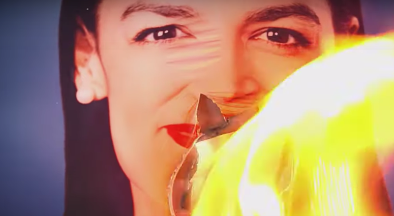 The ad. Burning AOC ad