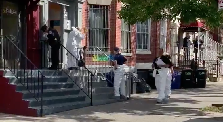 Crime scene investigators at the apartment. Woman found dead in Bronx apartment
