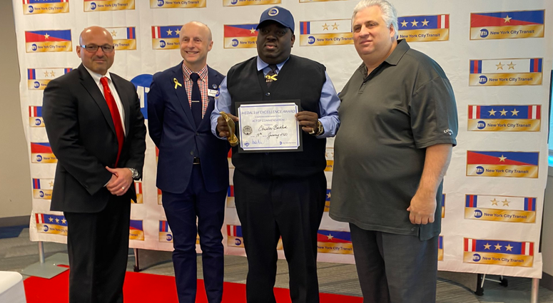 Bus driver Christer Beckford given MTA award Bus driver Christer Beckford given MTA award