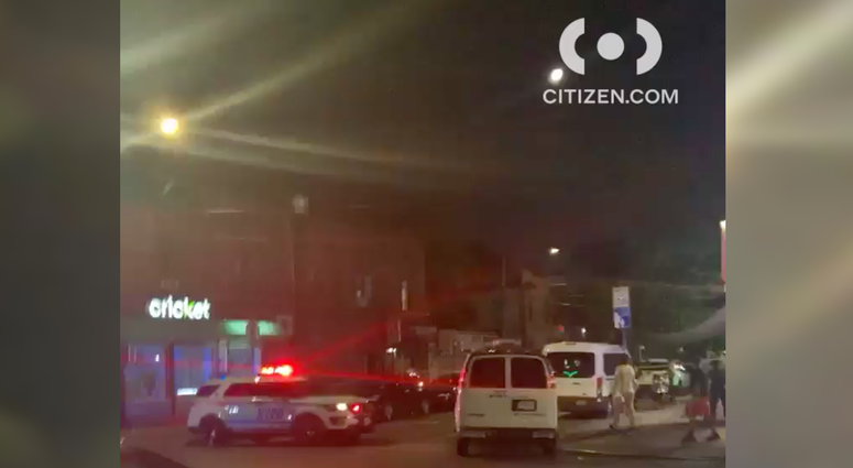 The shooting scene in Elmhurst. Shooting Elmhurst
