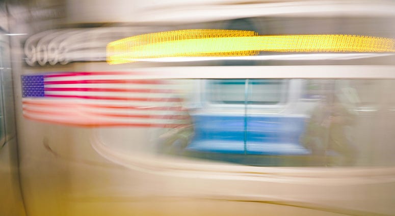 An image of a subway train in New York City. An image of a subway train in New York City.