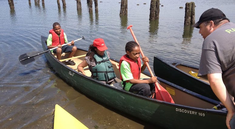 Kids kayaking at NYC Parks summer camp Kids kayaking at NYC Parks summer camp