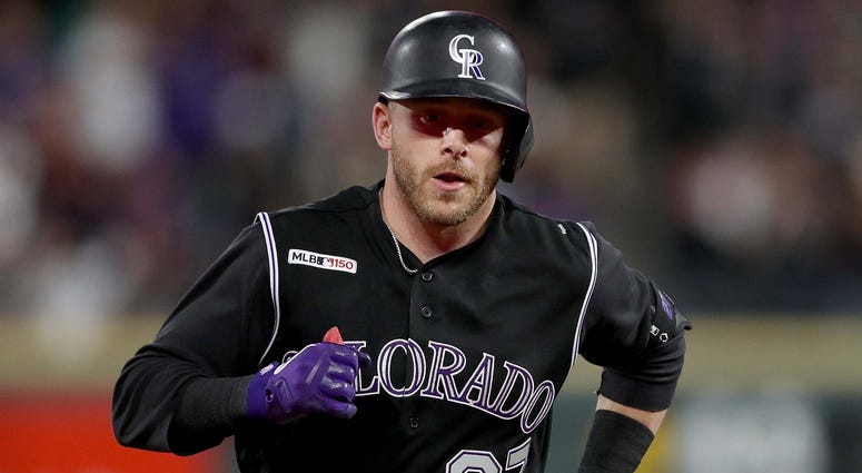 Trevor Story, Colorado Rockies Rockies shortstop Trevor Story rounds the bases after hitting a home run.