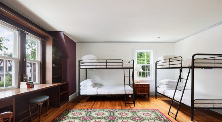 A bedroom. Trump Home Compass