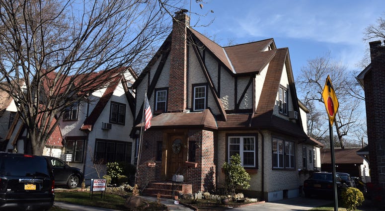 The exterior of the Jamaica Estates home in Queens. Trump Home Compass