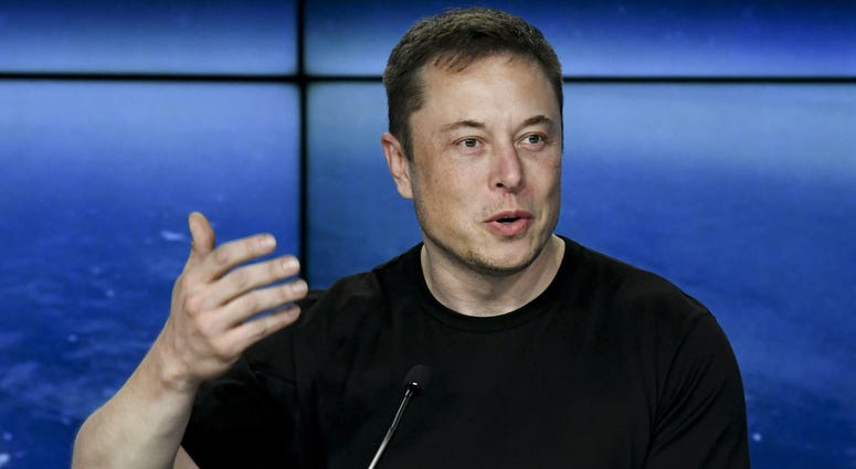 Elon Musk CEO of SpaceX, speaks to the media during a press conference after the Falcon Heavy Launch. Elon Musk