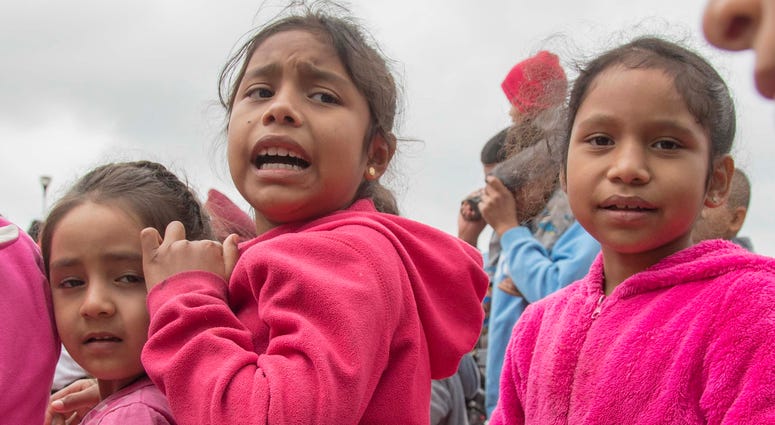 entral American migrant children camped outside the entrance of the San Ysidro port of entry. border children