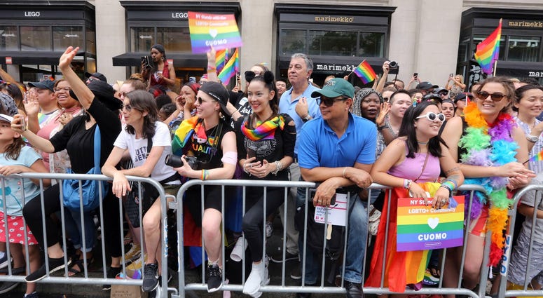Parade attendees line the streets of New York City. NYc Pride