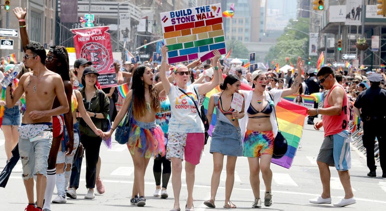 Marchers walk the parade route during the 2018 New York City Pride March. NYC Pride