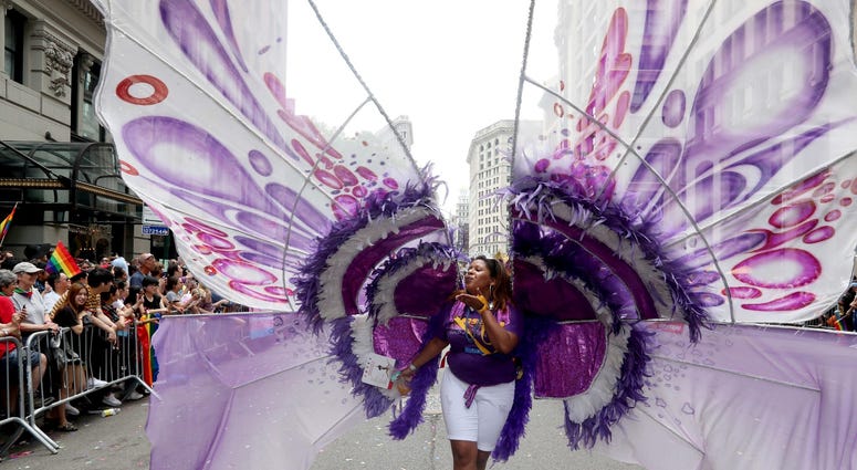 A marcher dressed as a butterfly. NYC Pride