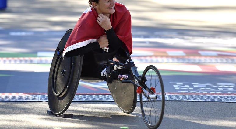 Manuela Schar reacts after winning the women's push rim wheelchair race at the 2018 TCS New York City Marathon. NYC Marathon