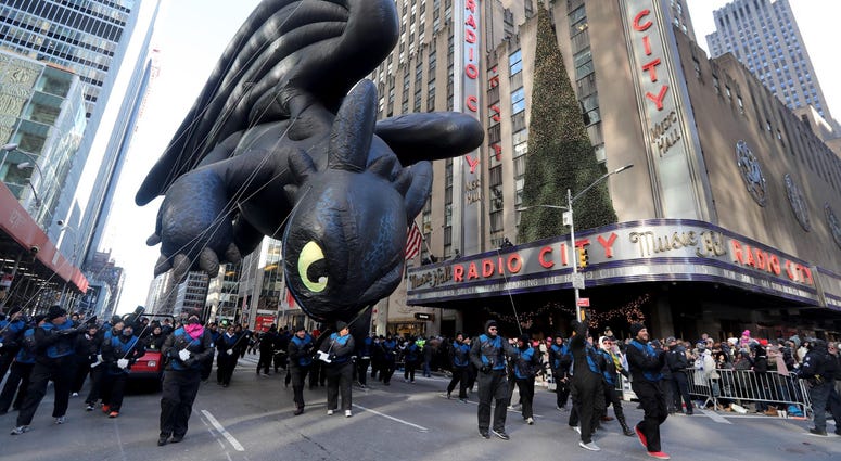 The Toothless the Dragon balloon from How to Train Your Dragon makes its way past Radio City Music Hall on 6th Ave. in Manhattan during the annual Macy's Thanksgiving Day Parade Nov. 22, 2018. Thanksgiving Parade