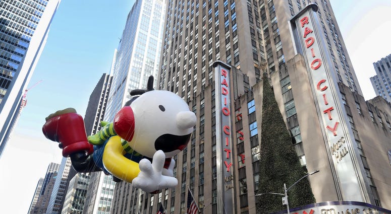 The Greg Heffley balloon from Diary of a Wimpy Kid makes its way past Radio City Music Hall on 6th Ave. in Manhattan during the annual Macy's Thanksgiving Day Parade Nov. 22, 2018. Thanksgiving Parade