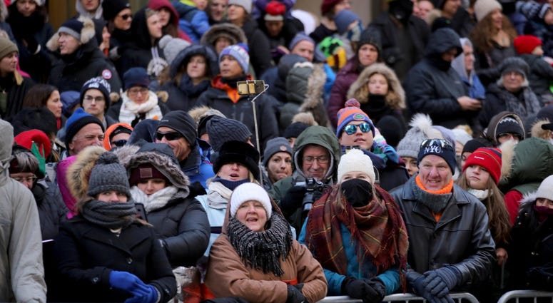 Spectators wrapped themselves in layers as they watched the annual Macy's Thanksgiving Day Parade in Manhattan Nov. 22, 2018. Thanksgiving Parade