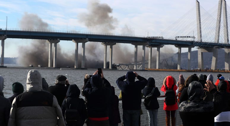 Spectators watch from Tarrytown as the Tappan Zee Bridge comes down with an implosion Jan. 15, 2019. Tappan Zee Bridge