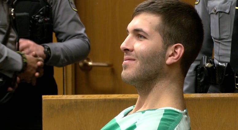 Anthony Comello, 24, the Staten Island man accused in the killing of reputed Gambino family boss Francesco \"Franky Boy\" Cali, smiles during his extradition hearing in State Superior Court in Toms River Monday, March 18, 2019. Anthony Comello