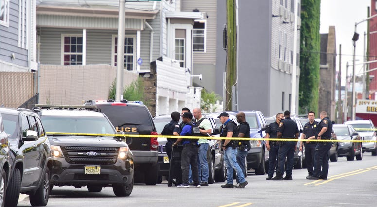 Paterson police respond to an active shooter barricaded in an apartment on Hamilton Ave and Straight St in Paterson, N.J. on Wednesday July 8, 2020. Paterson shooting