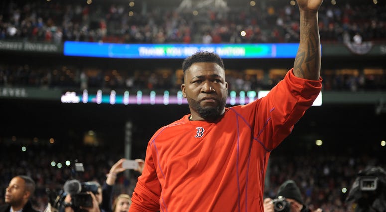 Boston Red Sox designated hitter David Ortiz (34) salutes the fans after the loss against the Cleveland Indians in game three of the 2016 ALDS playoff baseball series at Fenway Park. David Ortiz