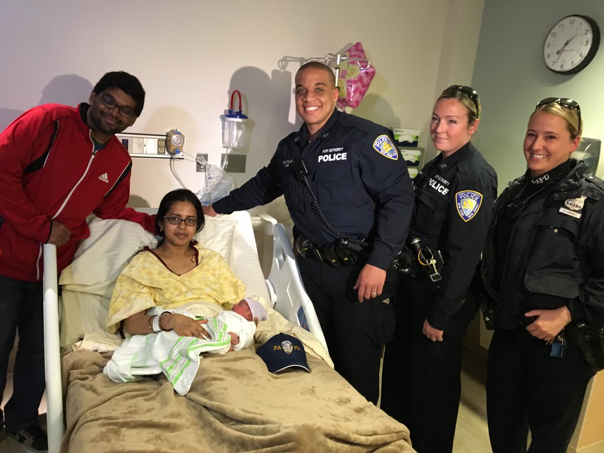 Baby, parents and PAPD Officers at Hoboken Hospital