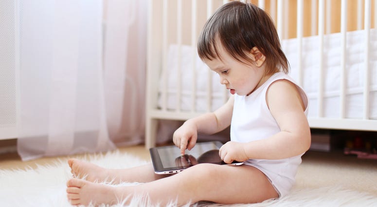 Baby playing with tablet Baby playing with tablet