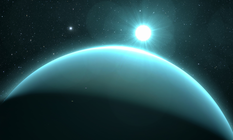 Planet Uranus with sunrise on the space background Planet Uranus with sunrise on the space background