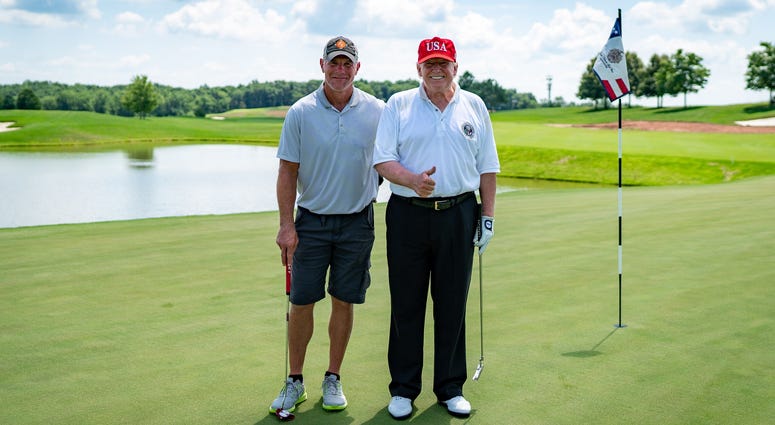 President Donald J. Trump poses for a photo with football legend Brett Favre at Trump National Golf Club in Bedminster Saturday, July 25, 2020, in Bedminster, N.J. President Donald J. Trump poses for a photo with football legend Brett Favre at Trump National Golf Club in Bedminster Saturday, July 25, 2020, in Bedminster, N.J. Official White House Photo by Tia Dufour