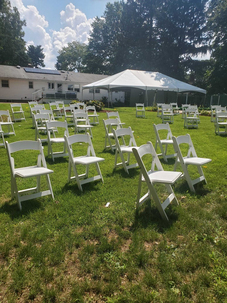 The scene of the backyard wedding in New Jersey. Ashley Isaacs and Israel Reches