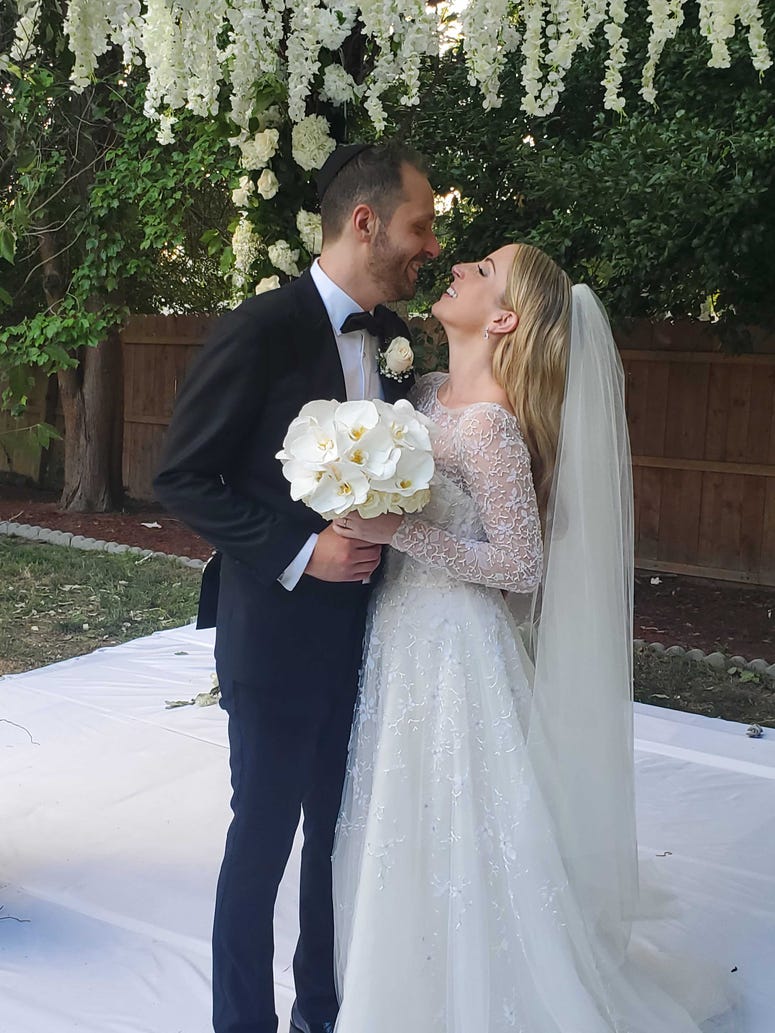 Newlyweds Ashley and Israel. Newlyweds Ashley and Israel