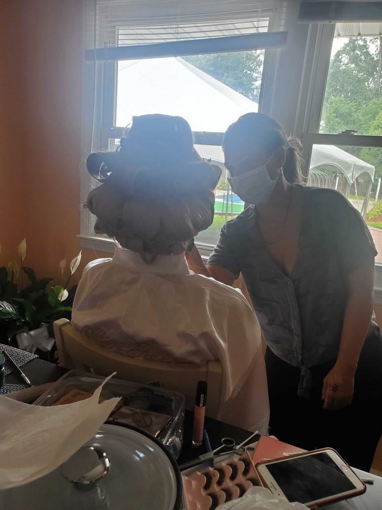 Ashley Isaacs getting ready for the wedding. Ashley Isaacs and Israel Reches
