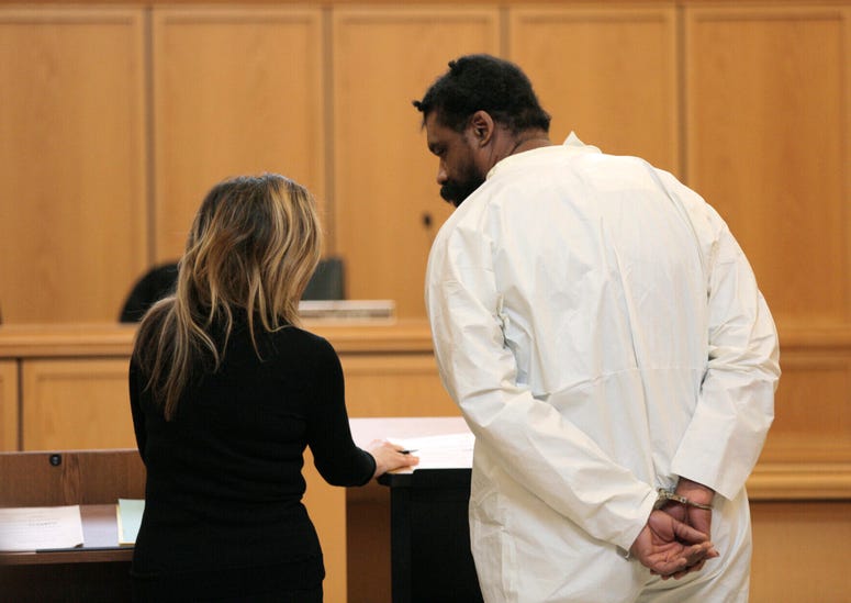 Grafton Thomas, right, appears for his arraignment at Ramapo Town Hall in Ramapo, N.Y., on Sunday, Dec. 29, 2019. Grafton Thomas