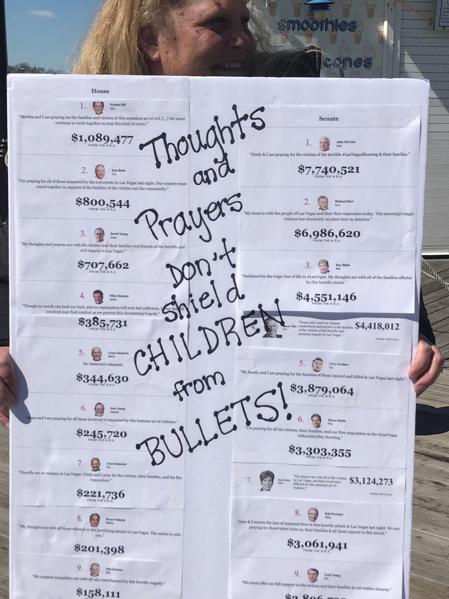 A woman holds a sign at a 'March For Our Lives' rally in Asbury Park. A woman holds a sign at a 'March For Our Lives' rally in Asbury Park.