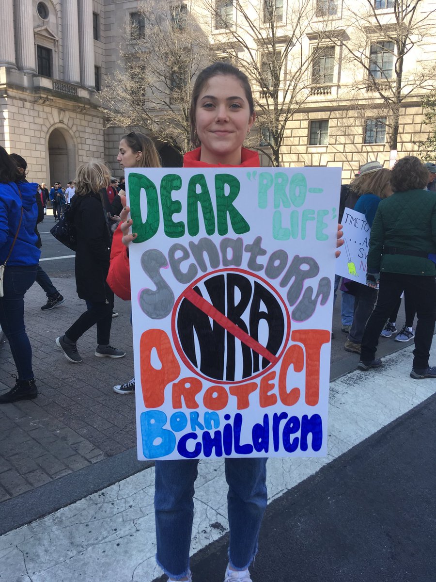 A girl holds a sign at the March for Our Lives rally in Washington D.C. A girl holds a sign at the March for Our Lives rally in Washington D.C.