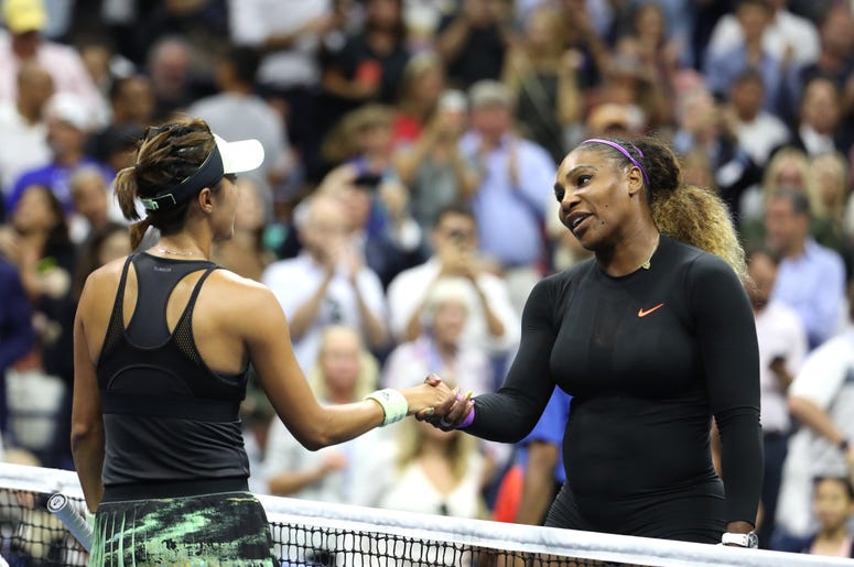 Serena Williams of the United States meets Qiang Wang of China at the net after defeating her on day nine of the 2019 US Open ( Al Bello/Getty Images)
