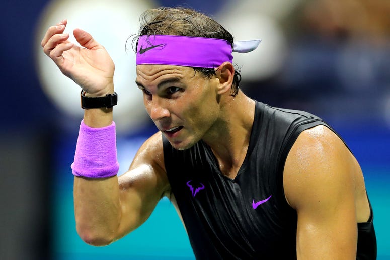 afael Nadal of Spain reacts during his Men's Singles quarterfinal match against Diego Schwartzman of Argentina on day ten of the 2019 US Open (Elsa/Getty Images)