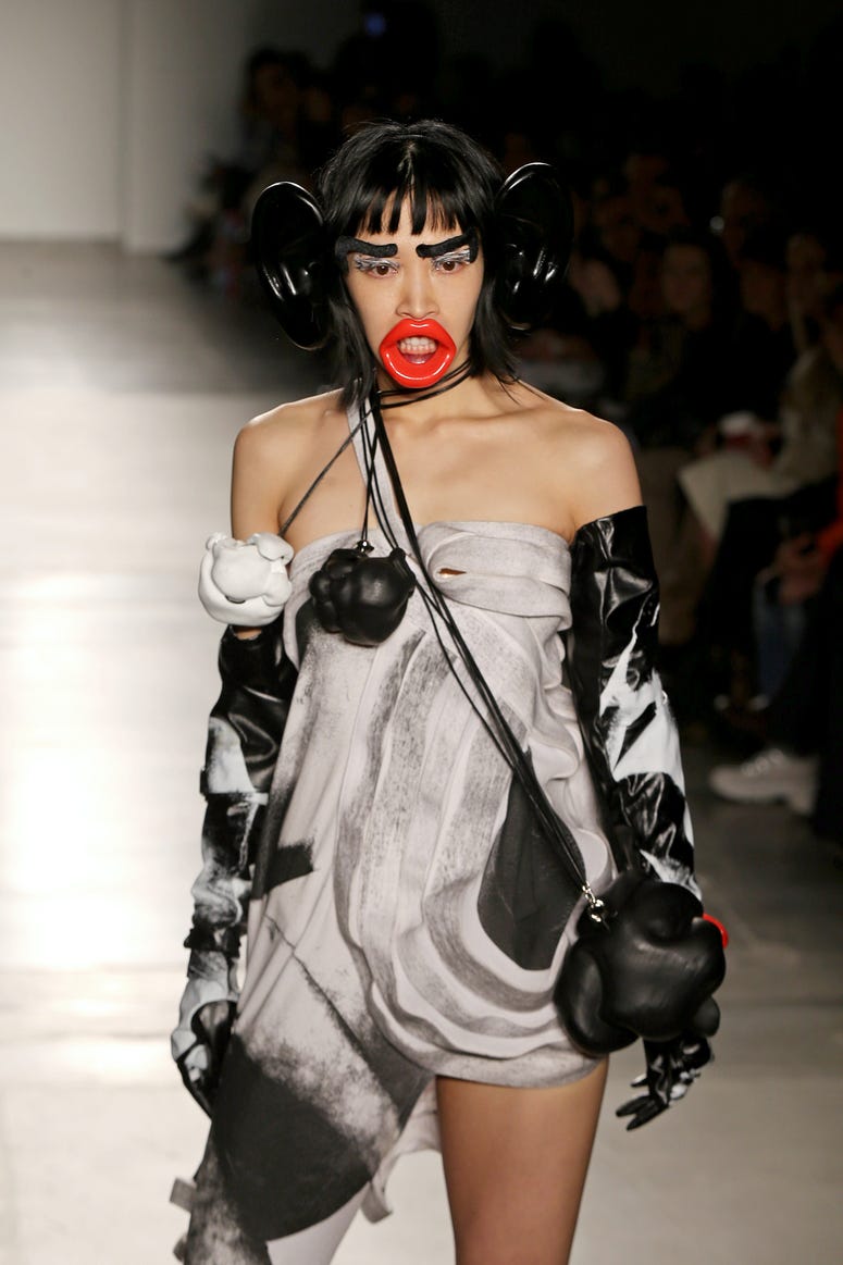 A model walks the runway wearing Junkai Huang during the Fashion Institute Of Technology's Fine Art Of Fashion And Technology Show at Pier 59 Studios on February 07, 2020 in New York. FIT fashion show