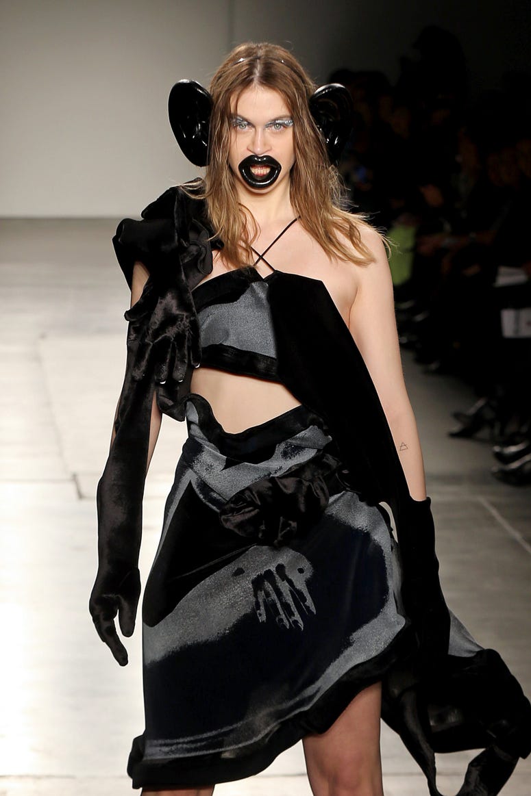 A model walks the runway wearing Junkai Huang during the Fashion Institute Of Technology's Fine Art Of Fashion And Technology Show at Pier 59 Studios on February 07, 2020 in New York, New York. FIT fashion show