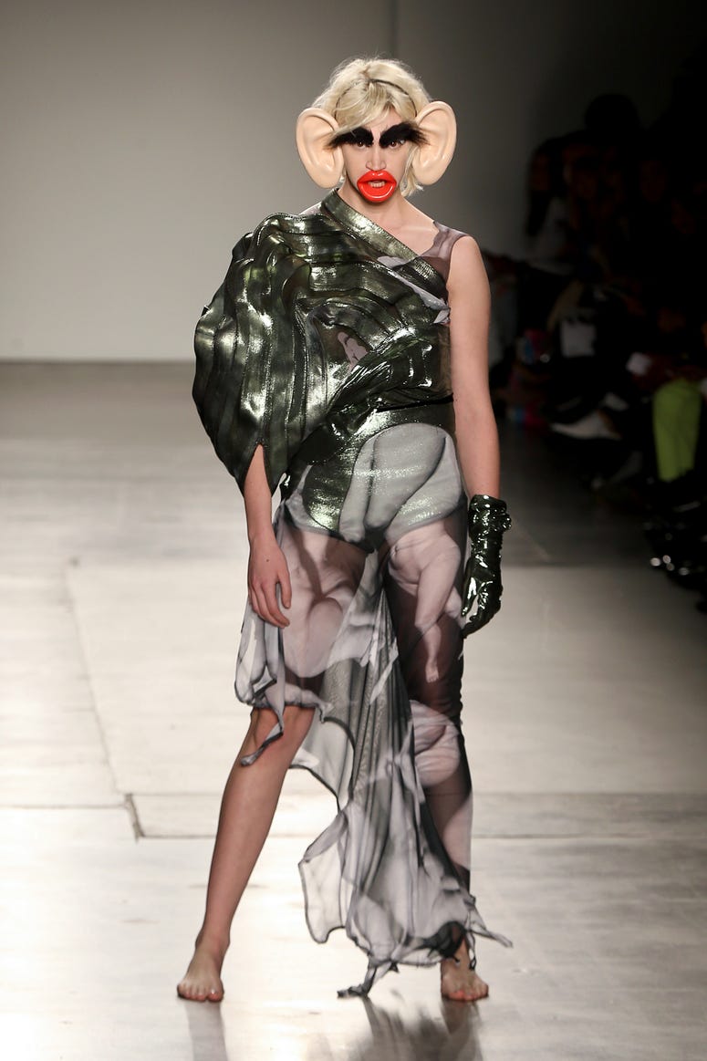 A model walks the runway wearing Junkai Huang during the Fashion Institute Of Technology's Fine Art Of Fashion And Technology Show at Pier 59 Studios on February 07, 2020 in New York. FIT fashion show