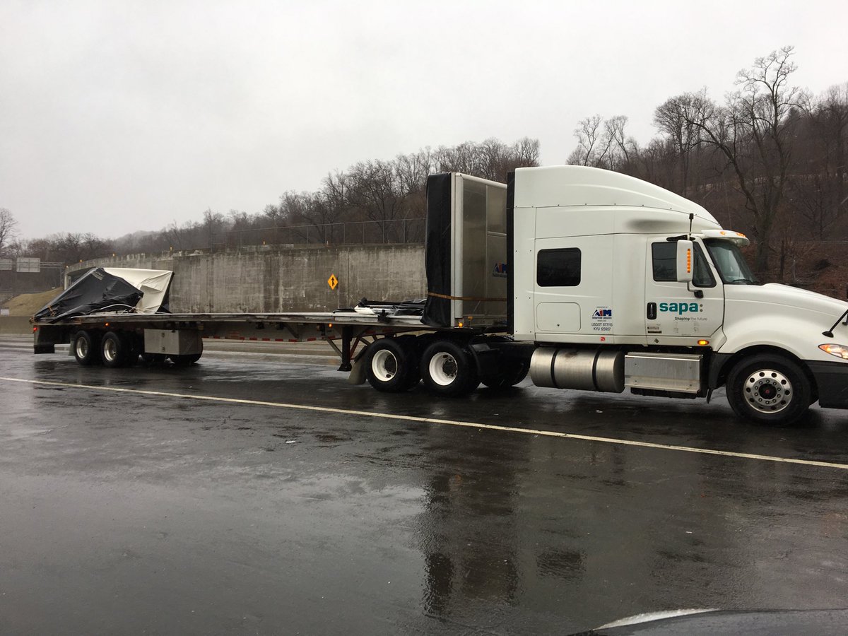 Tractor-Trailer's Canvas-Sided Trailer Shredded by high winds on the Tappan Zee Bridge.