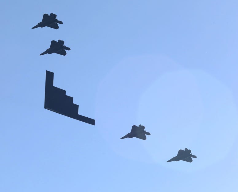 United States military aircraft fly above the Hudson River, as seen from Yonkers, during a \"Salute to Great Cities of the American Revolution\" flyover, July 4, 2020. NYC flyover
